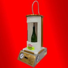 Secure Pak Seal Integrity Tester with glass bottle loaded in the testing chamber
